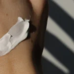 skin lotion on skin