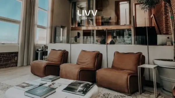 Modern wellness clinic lounge with comfortable leather chairs and natural light